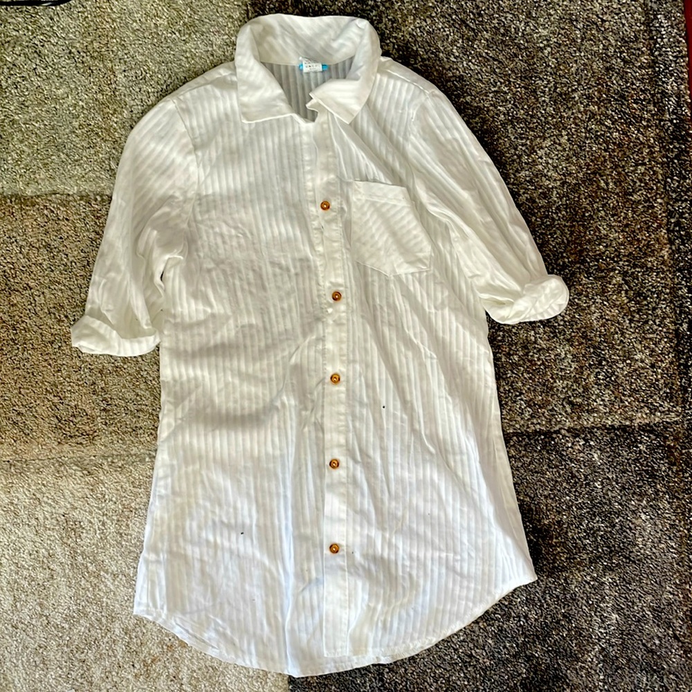 Oversized white blouse.